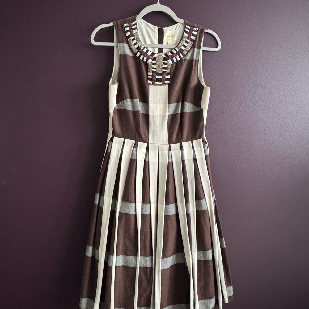 Anthropologie sleeveless pleated dress with bead detail at neck